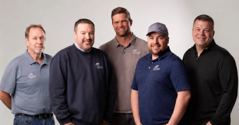 The Lakeside Exteriors team in branded Lakeside Exteriors apparel