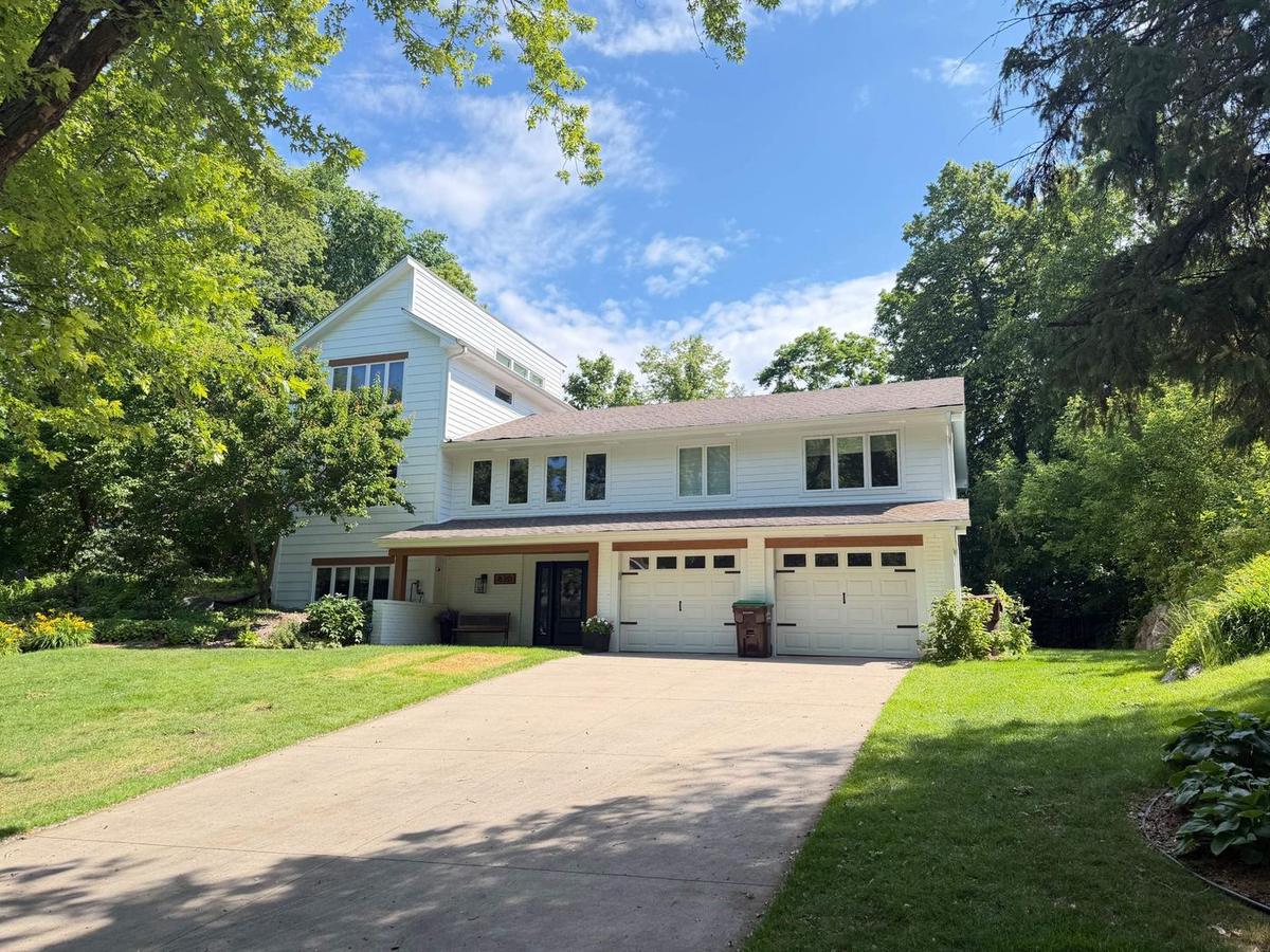 Completed full exterior renovation with ProVia Endure windows, entry doors, and white lap siding in Plymouth, MN