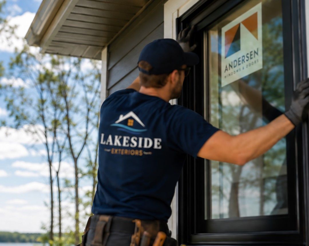 Lakeside Exteriors crew installing an Andersen replacement window in Mound, MN